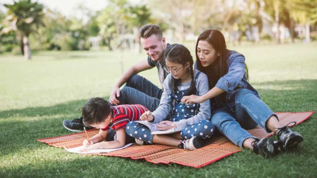 family outside in the park