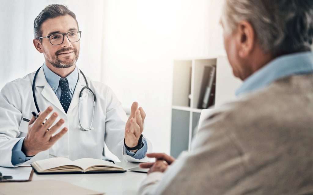 Consultation,,Man,And,Doctor,In,Office,With,Advice,,Help,And