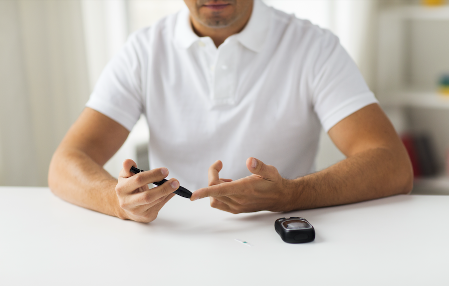 Functional health coach using lab testing to identify insulin resistance in client consultation